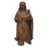 An oak sculpture of Saint Anne, the Virgin and the Child Jesus, with traces of polychrome paint, 15t