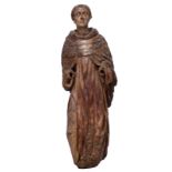 A walnut sculpture of a male Saint (monk), with traces of polychrome paint and gilt, 16th/17thC, pro
