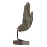 The hand of the Buddha , patinated bronze, attached to a metal base, H 34,5 - W 8,5 - D 16,5 cm