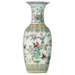 A Chinese famille rose vase, decorated with cockerels in a garden, the neck encircled with ruyi lapp