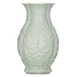 A rare Chinese celadon floral relief decorated vase, with a seal mark, probably 18thC, H 27,5 cm