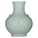 A Chinese celadon relief bottle vase, the handles ram's head-shaped, with a Qianlong seal mark, H 35