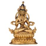 A Sino-Tibetan gilt bronze seated Buddha on a ditto double lotus base, H 13,5 cm