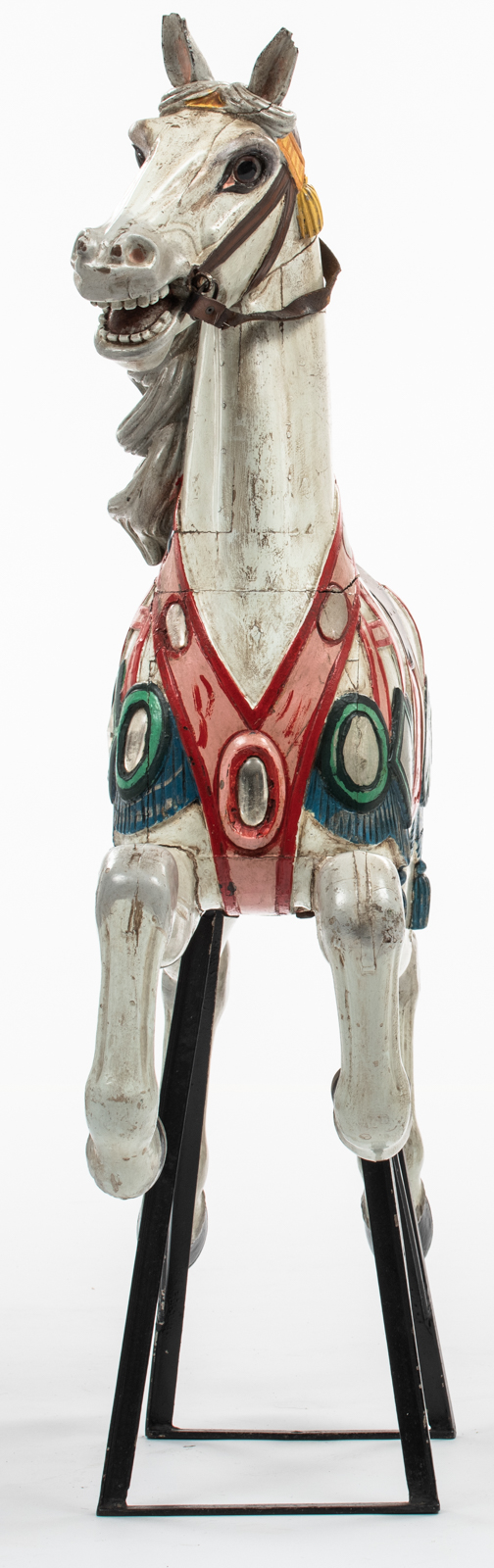 A polychrome painted carousel horse, with glass and silver foil inlay, mounted on a later period wro - Image 3 of 5