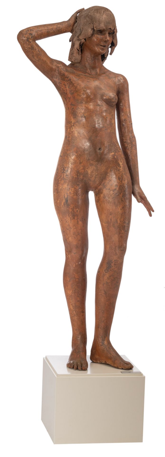 Dumortier J., 'Sirene', a patinated terracotta sculpture of a naked standing woman, on a white paint