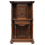 A fine walnut Renaissance Revival credenza, richly sculpted with Renaissance ornaments, the centre d