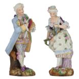 A pair of cold painted biscuit sculptures of a marquis and a marquise, H 51 - 53 cm