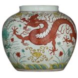 A large Chinese polychrome vase, decorated with two five-clawed dragons, chasing each other, marked,