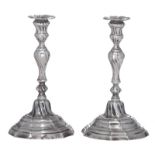 A pair of silver Rococo candlesticks, indistinctly hallmarked, most probably the Southern Netherland