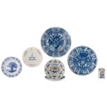 Two large blue and white decorated Wanli style Dutch Delftware plates, one marked 'De Vergulde Blomp