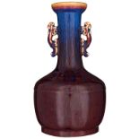 A Chinese flambé glazed bottle vase, with a Yongzheng mark, H 27,5 cm