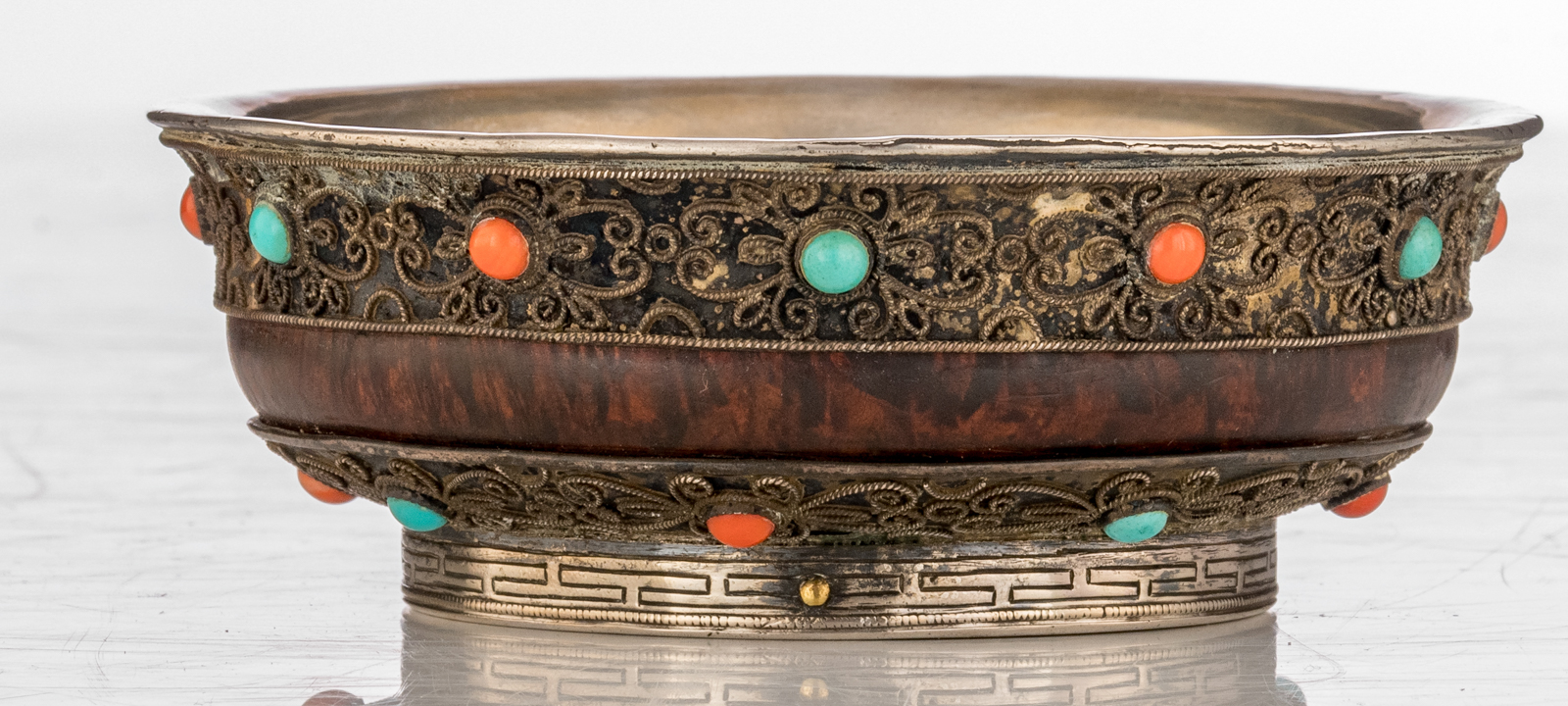 A Sino-Tibetan silver and wooden tsampa bowl, inlaid with coral and turquoise stones, the bottom rim - Image 5 of 7