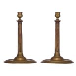 A rare pair of French bronze Henri II-type column candlesticks, 17thC, H 29,5 ø 19,5 cm