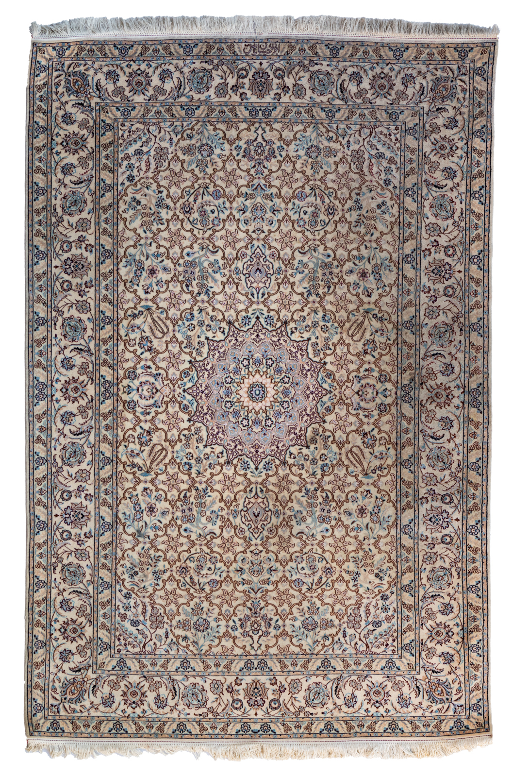 An Oriental woollen rug decorated with floral motifs, signed, 197 x 130 cm