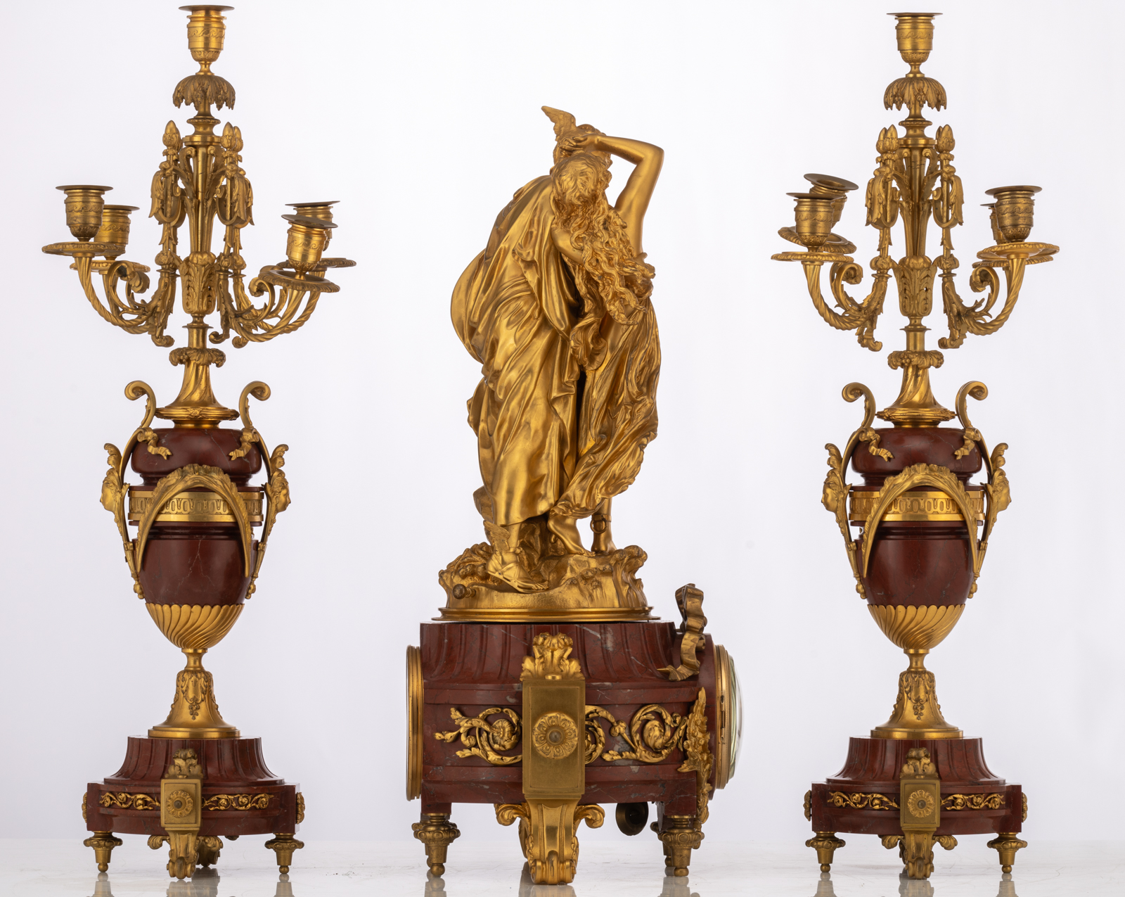A Neoclassical three-piece rouge Napoleon marble garniture, consisting of a pair of vase-shaped cand - Image 4 of 9