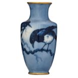 A hand painted Japonism soft-porcelain vase, blue and white decorated with magpies on a branch, sign