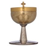 A 1950s silver and gilt silver chalice and cover, with the matching spoon, marked Durieu, Kain, tota