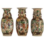 Three Chinese famille rose stoneware vases, decorated with warrior scenes, marked, H 44 - 45 cm