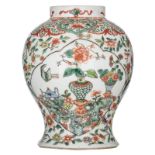 A Chinese famille verte floral decorated vase, the roundels with flowers and flower baskets, with a
