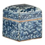 A Chinese blue and white Ming style quadrangular box and cover, decorated with dragons amidst clouds