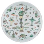 A large Chinese famille verte deep dish, both sides decorated with antiquities, flowers and auspicio