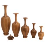 A collection of Art Deco timber vases, attributed to De Coene Frères, Belgium, 1930s; added a matchi