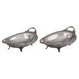 A pair of 19thC Rococo Revival silver vegetable dishes, Austro Hungarian, 13 lothige 812/000, with a