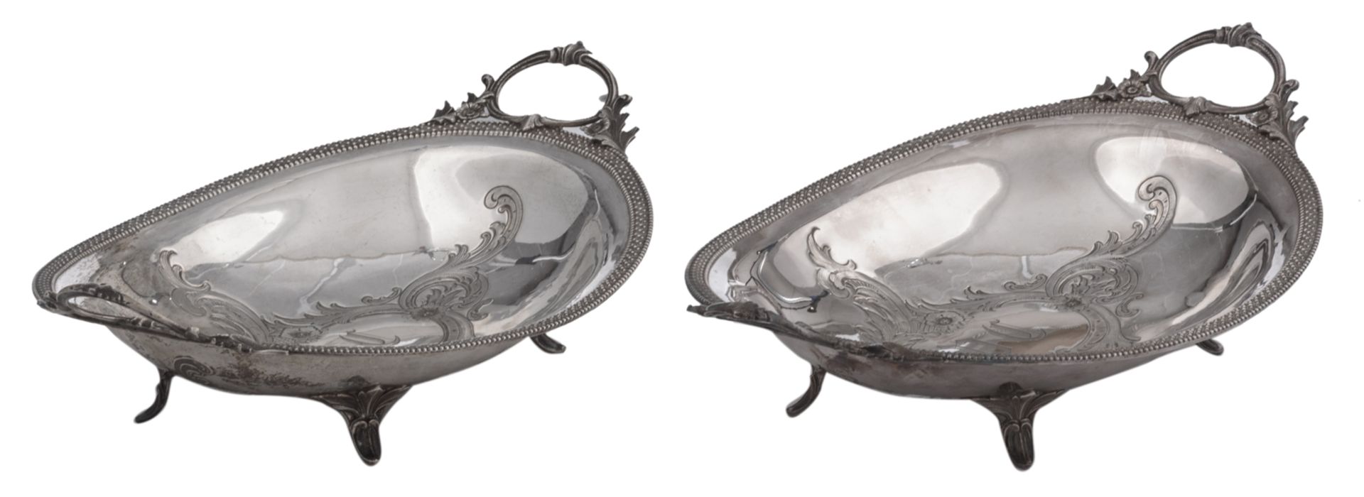 A pair of 19thC Rococo Revival silver vegetable dishes, Austro Hungarian, 13 lothige 812/000, with a