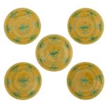 Five Chinese yellow ground and green flower decorated saucers, marked, ø 11 cm