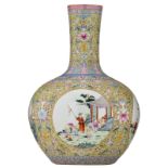 A Chinese yellow ground famille rose bottle vase, decorated with symbols of longevity, the roundels