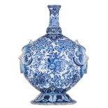 A Dutch Delftware blue and white pilgrim flask, with floral and the so-called parsley decoration, th