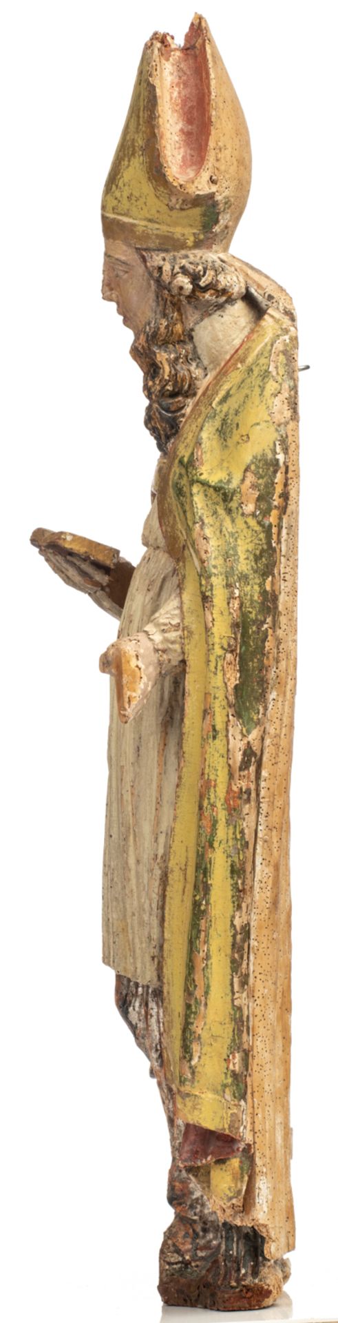 A limewood sculpture of a Saint, with traces of polychrome paint, 17thC, H 109 cm - Image 2 of 6