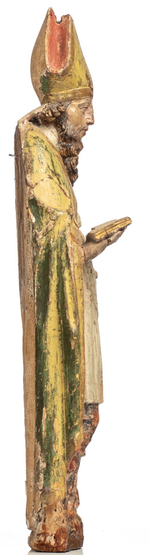 A limewood sculpture of a Saint, with traces of polychrome paint, 17thC, H 109 cm - Image 4 of 6