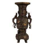 An Oriental bronze vase, relief decorated with dragons, phoenix and cranes, H 75,5 cm