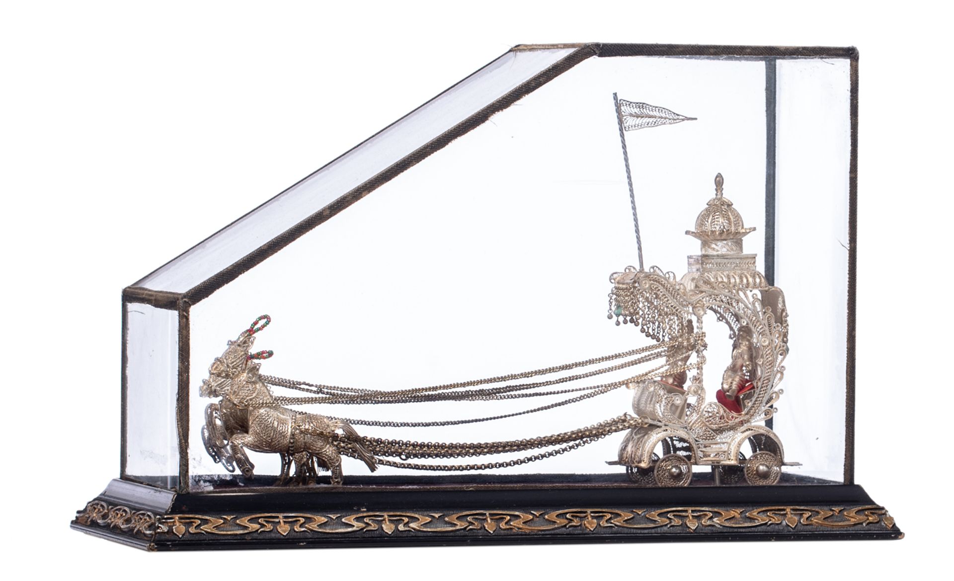 An Oriental silver filigree horse-drawn carriage, in a glass case with an Art Nouveau decorated base