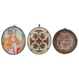 Three various devotional items: one oval-shaped 18thC recto-verso reliquary medallion with relics of