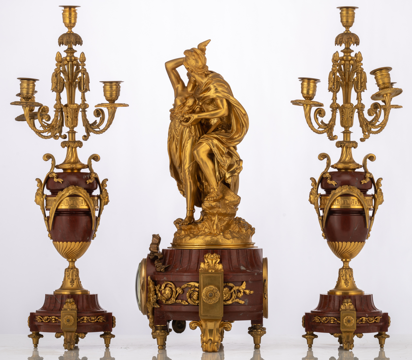 A Neoclassical three-piece rouge Napoleon marble garniture, consisting of a pair of vase-shaped cand - Image 2 of 9