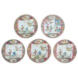 Four Chinese famille rose dishes, decorated with a romantic scene in a garden; added a ditto dish, 1