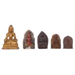 Four Oriental pottery clay relief Tsa Tsa figures, depicting a seated Buddha, two figures, polychrom