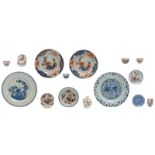 Various Chinese polychrome, blue and white and Imari dishes, cups, saucers and a box and cover, 18th