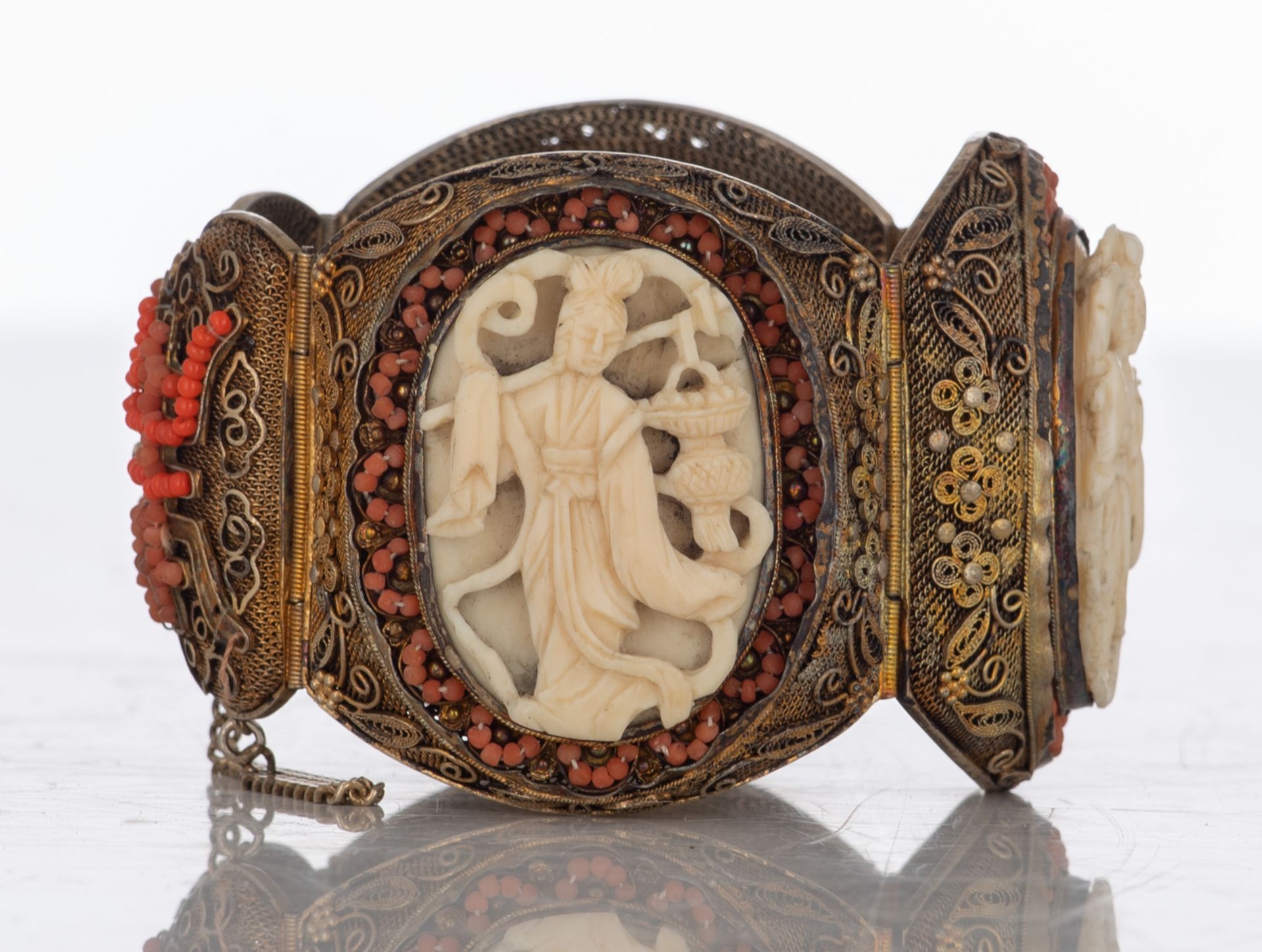 An Oriental filigree gilt silver bracelet set with basso-relievo cut ivory plaques surrounded by cor - Image 5 of 8