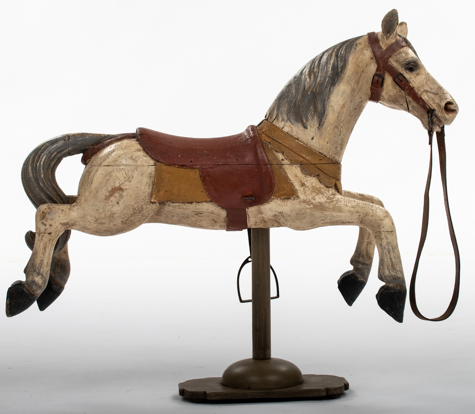 A wooden polychrome painted carousel horse mounted on a recent wooden stand, H (with stand) 138 cm / - Bild 4 aus 4