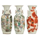 A Chinese polychrome double decorated vase with an animated scene and a bird in a river landscape; a