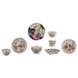 A Chinese export porcelain tobacco leaf cup and saucer, two gilt and famille rose cups and saucers,