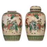 A pair of crackleware ground Nanking ginger jars and covers, all-over decorated with animated scenes