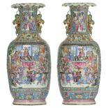 A pair of large Chinese famille rose relief vases, decorated with court scenes and animated scenes,