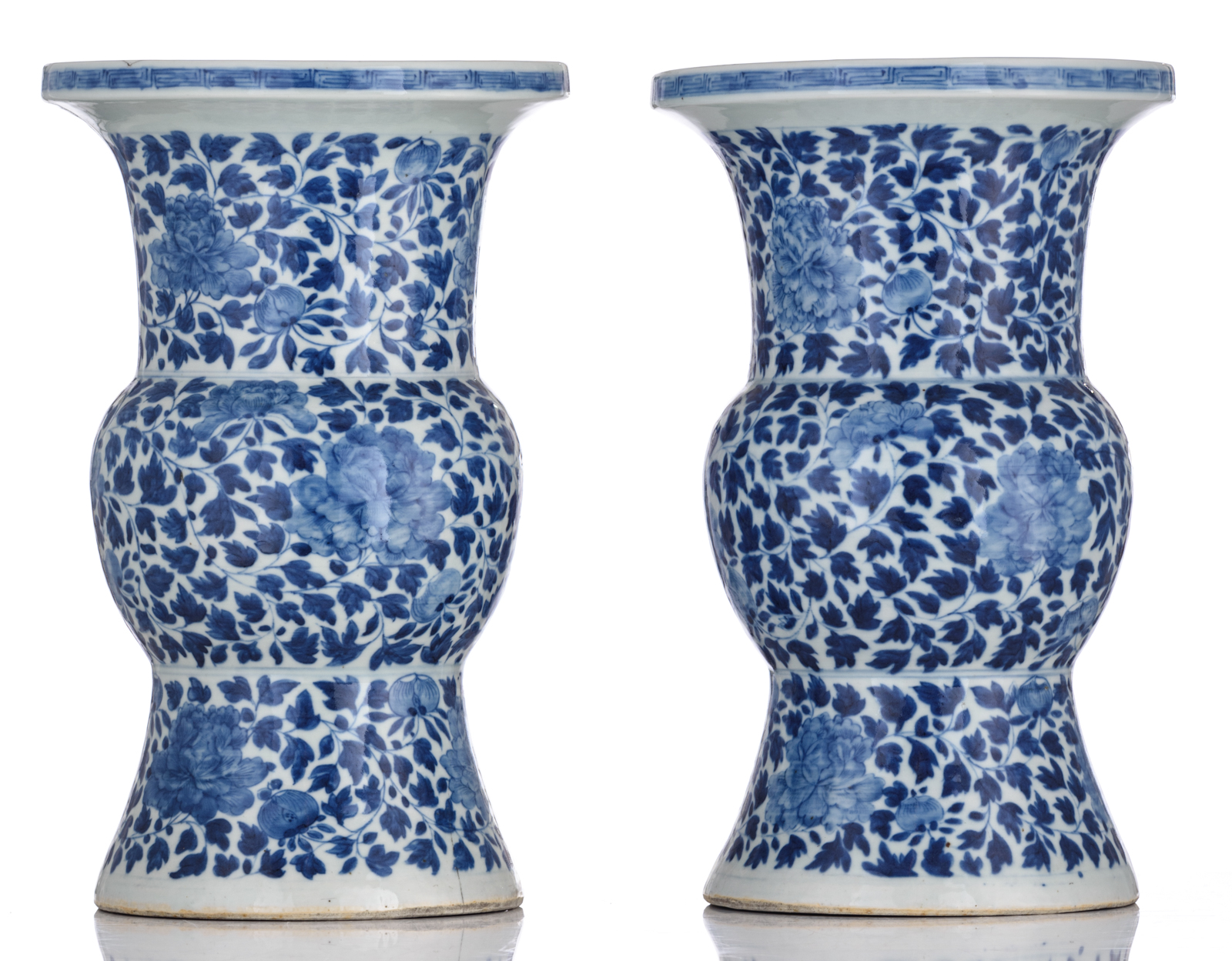 A pair of Chinese blue and white floral decorated Gu vases, 19thC, H 40,5 cm - Image 4 of 6