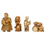 Three carved ivory netsuke: one depicting a kabuki-mask wearing kid, late Edo - early Meiji period,