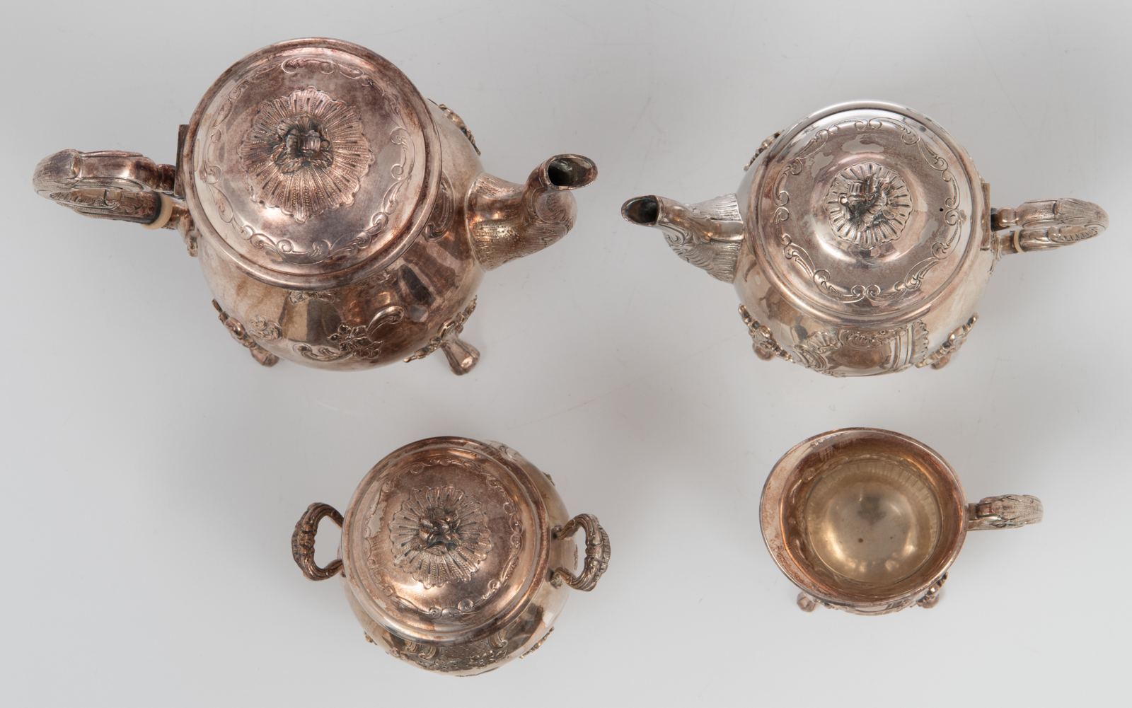 A Wiskemann marked Rococo style four-piece silver plated coffee and tea set, decorated with flower-s - Image 20 of 29