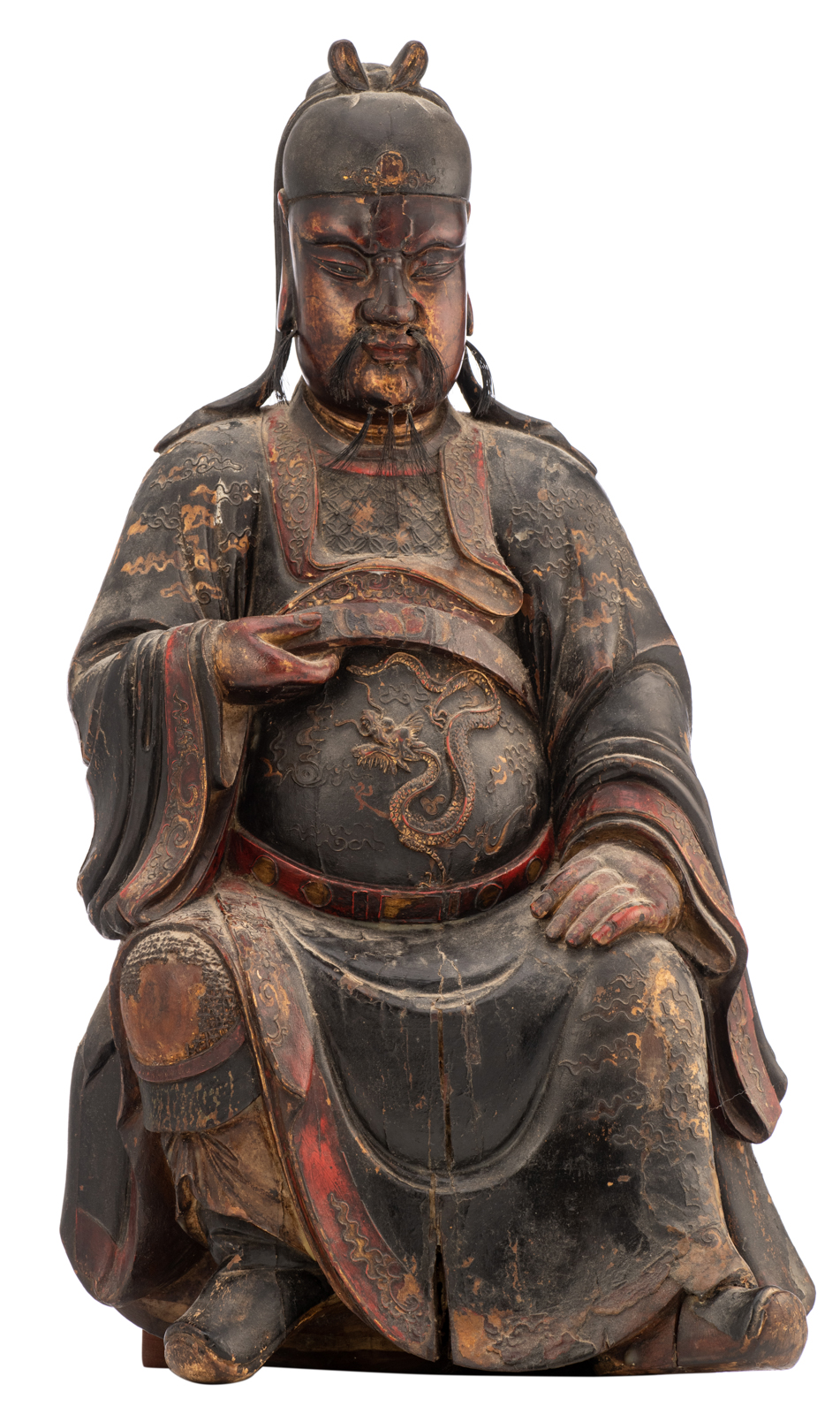 A Chinese polychrome lacquered, relief lacquered and gilt wooden sculpture depicting a seated empero